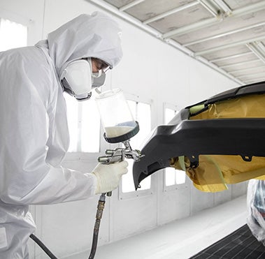 Collision Center Technician Painting a Vehicle | Maverick Toyota in Lemon Grove CA